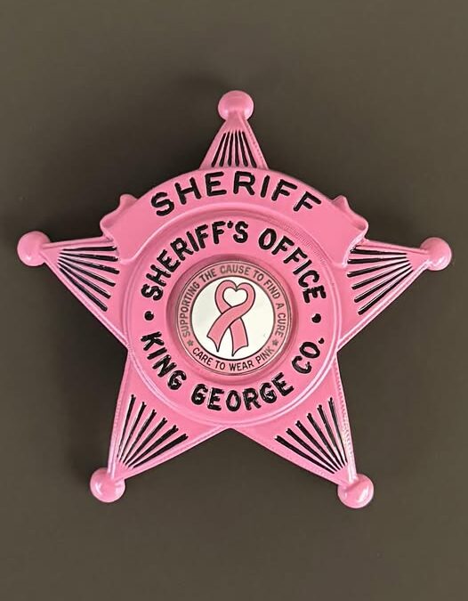 Pink badges and pins honor breast cancer victims and survivors in King George