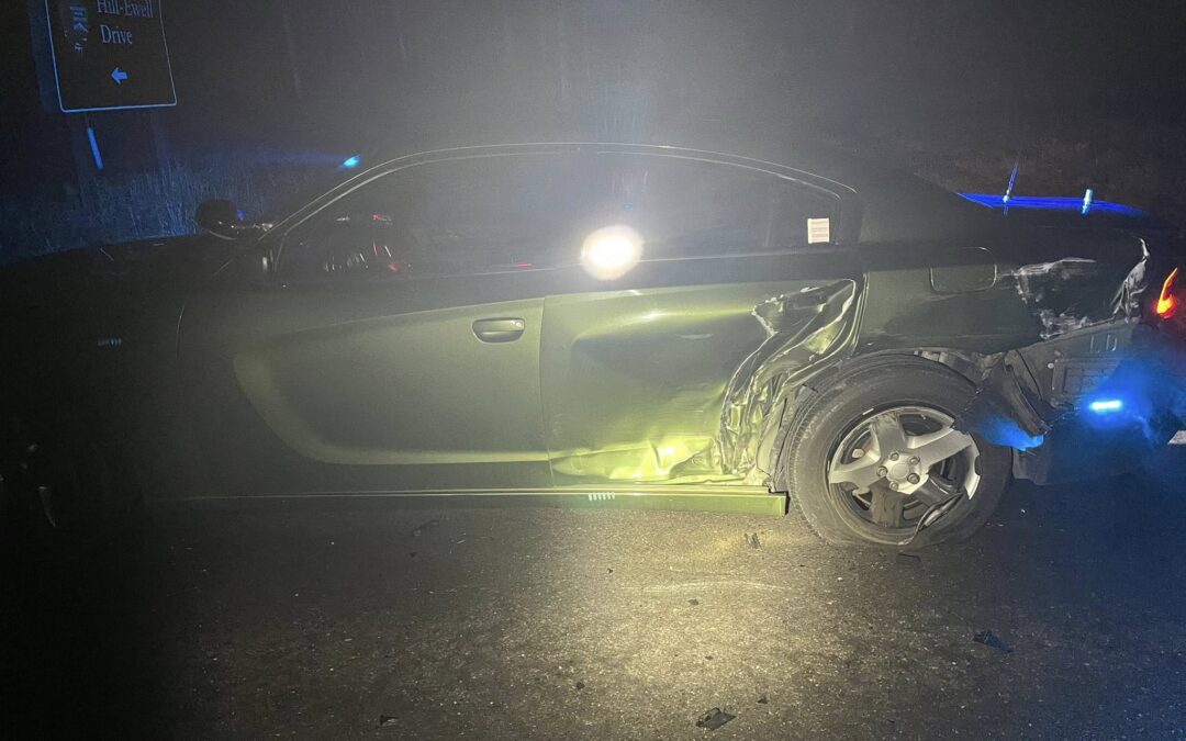 Deputy narrowly avoids injury after patrol vehicle hit in Locust Grove