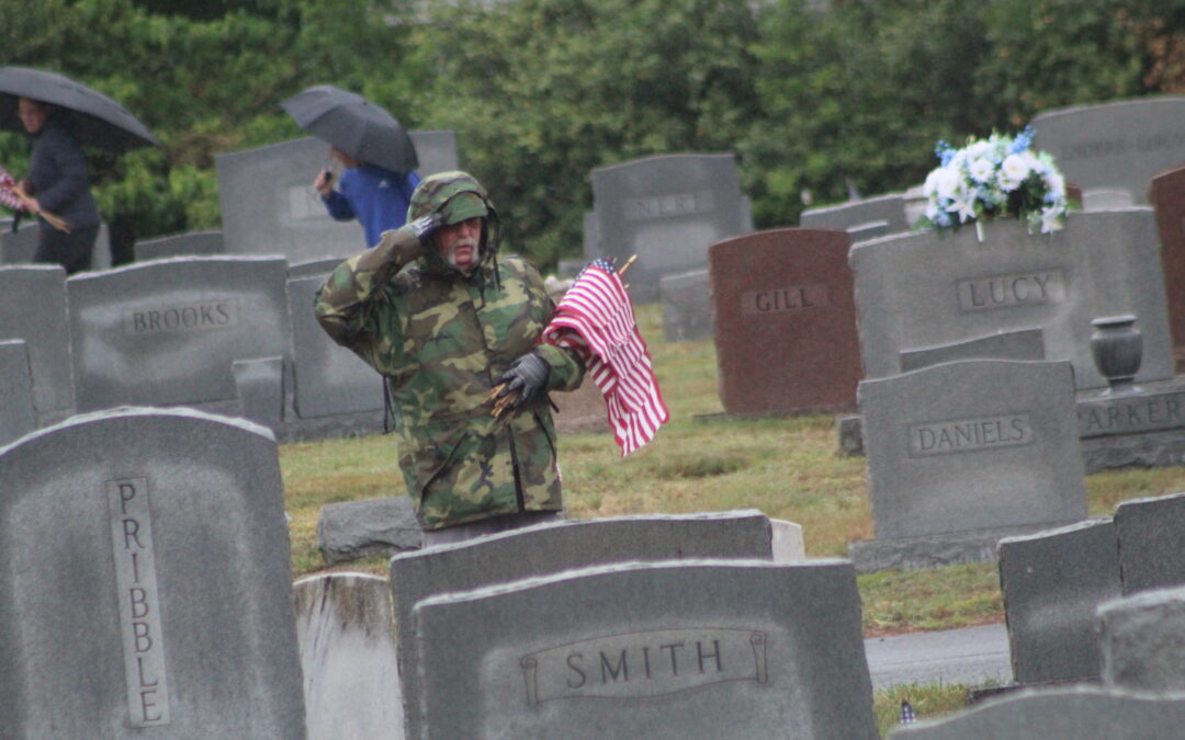 PHOTOS:  VFW honors veterans with flag placement at Oak Hill Cemetery