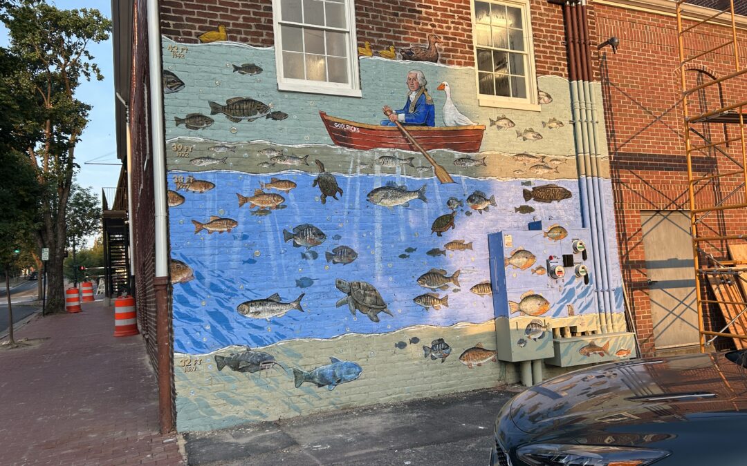 PHOTOS:  Artist beats the heat to keep Goolrick’s mural on schedule